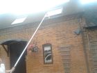 Gutter Vac &amp; long pole system used to clear gutters